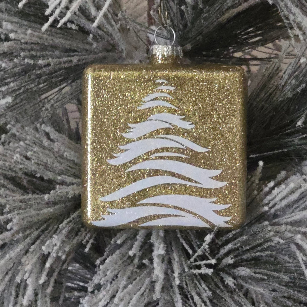 Gold glittery square ornament with white artistic tree